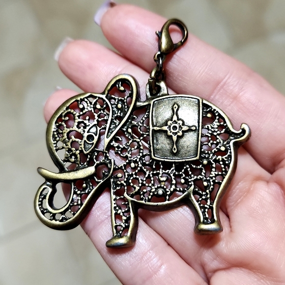 Anthropologie Accessories - Anthropologie Pierced Brass Elephant Charm